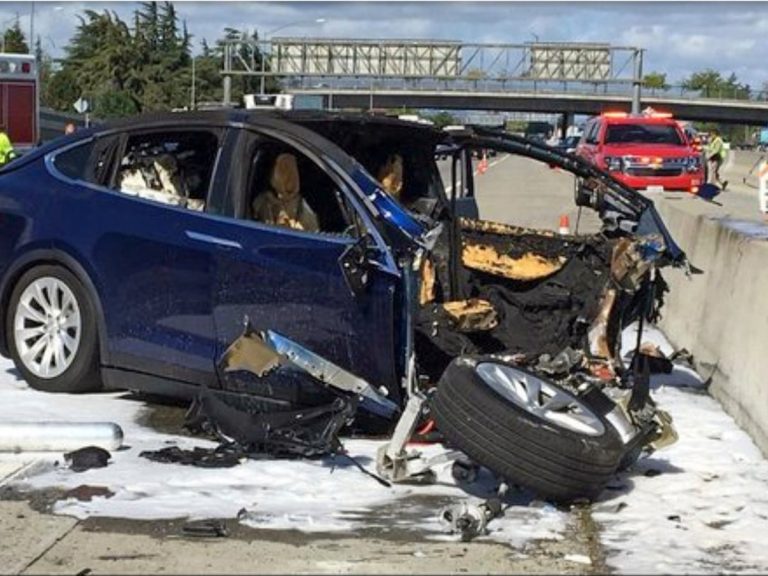 nhtsa investigates tesla delayed crash reports fueling ev industry debate